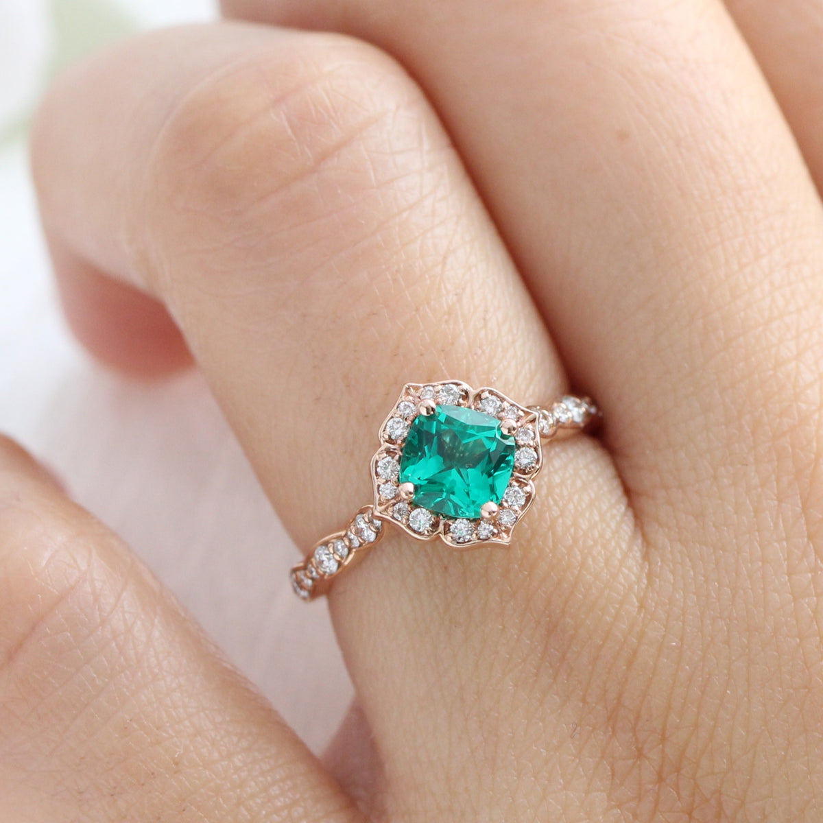 vintage inspired emerald engagement ring in rose gold diamond band by la more design jewelry