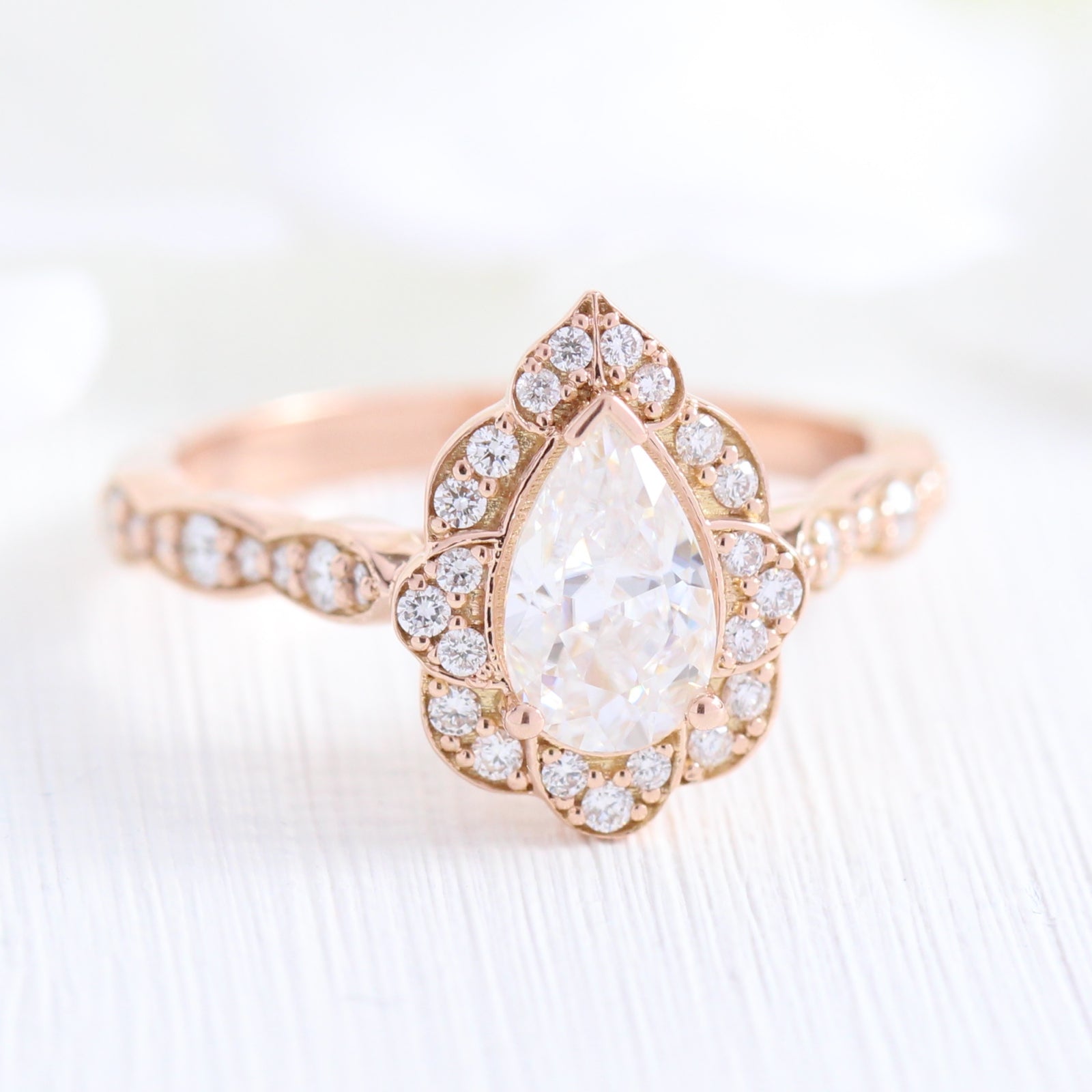 vintage inspired pear moissanite engagement ring in rose gold diamond scalloped band by la more design jewelry