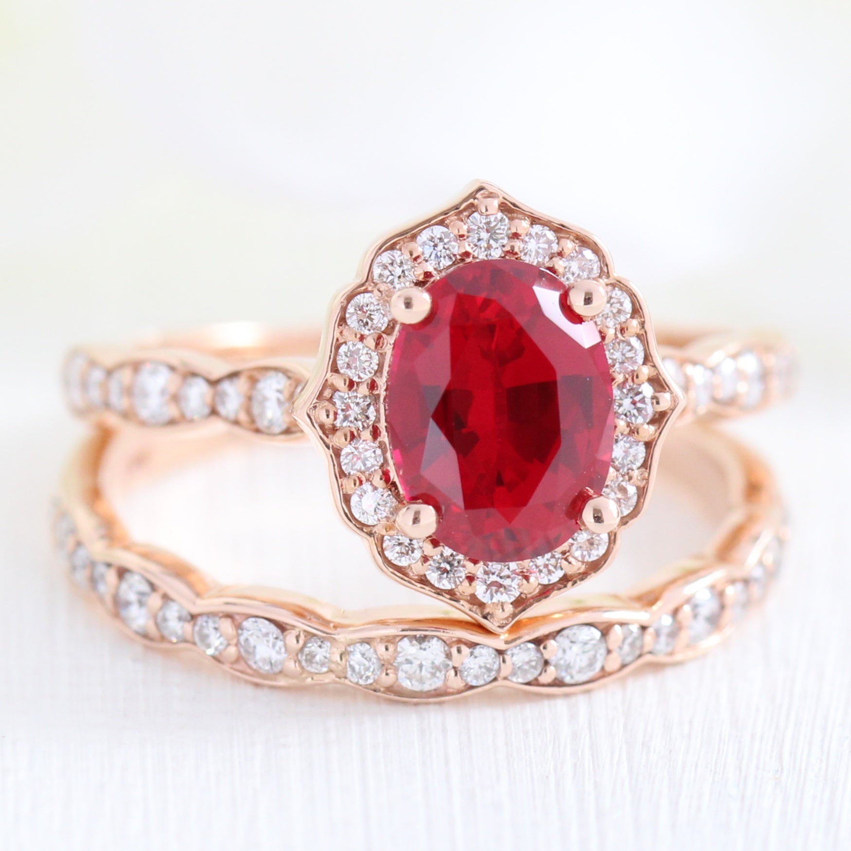 vintage inspired ruby ring and matching diamond wedding band in rose gold bridal set by la more design jewelry