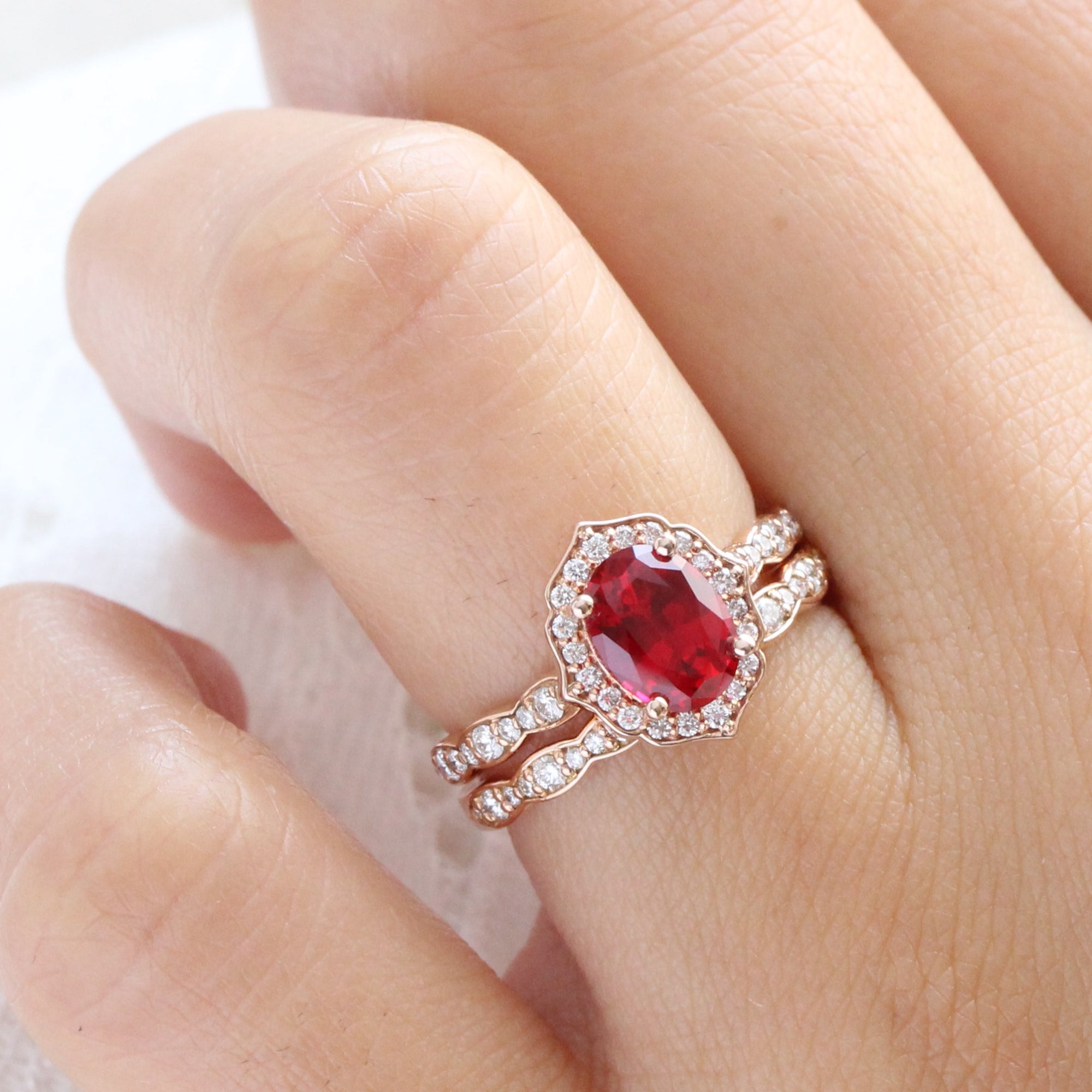 vintage inspired ruby ring and matching diamond wedding band in rose gold bridal set by la more design jewelry