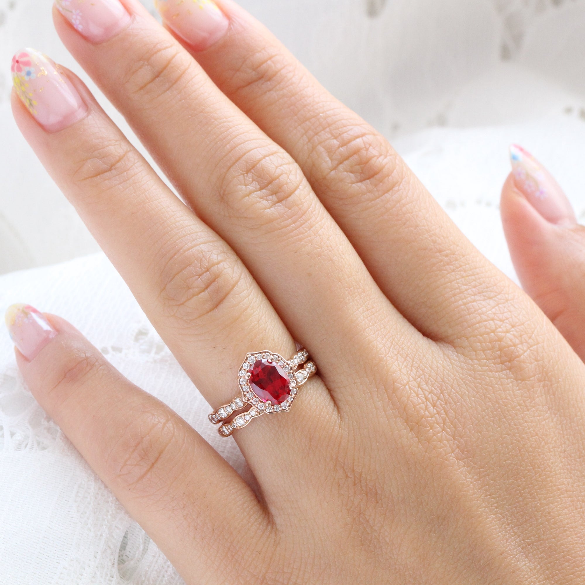 vintage inspired ruby ring and matching diamond wedding band in rose gold bridal set by la more design jewelry