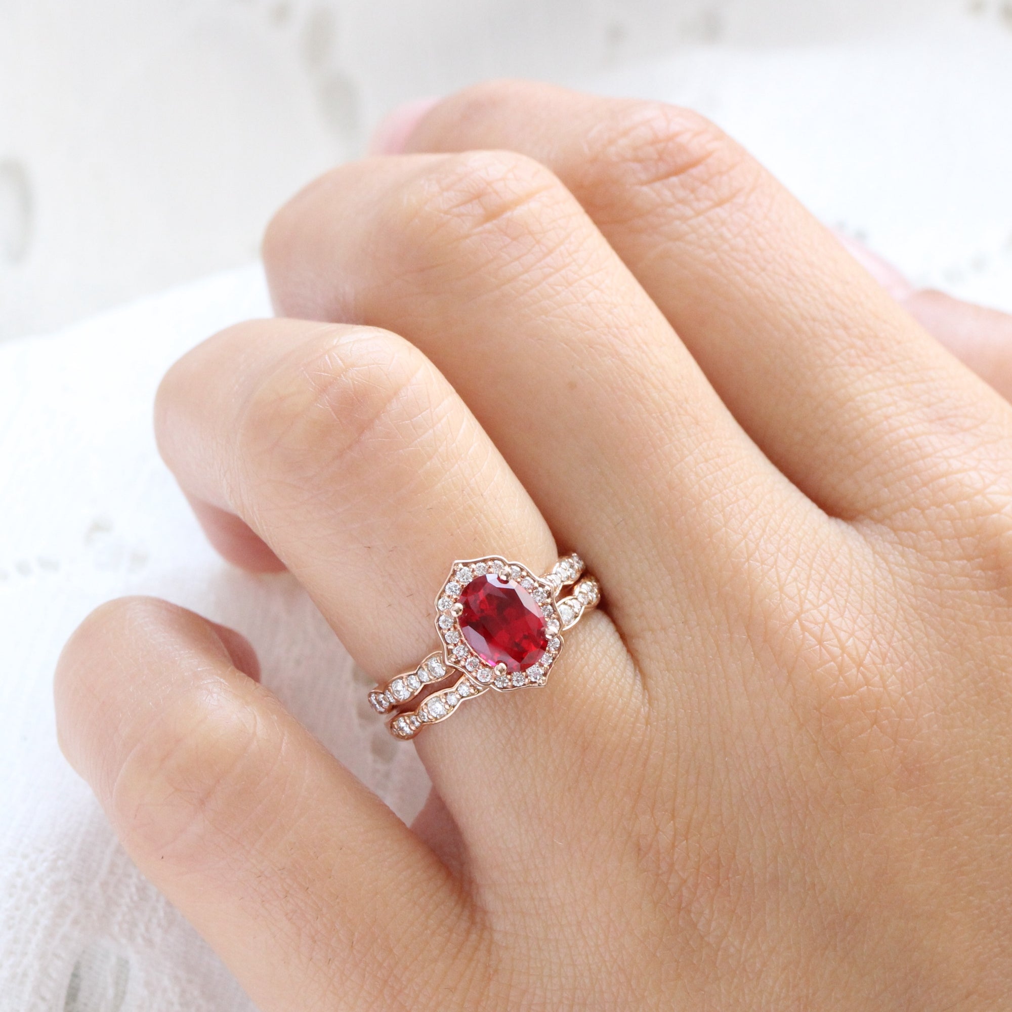 vintage inspired ruby ring and matching diamond wedding band in rose gold bridal set by la more design jewelry