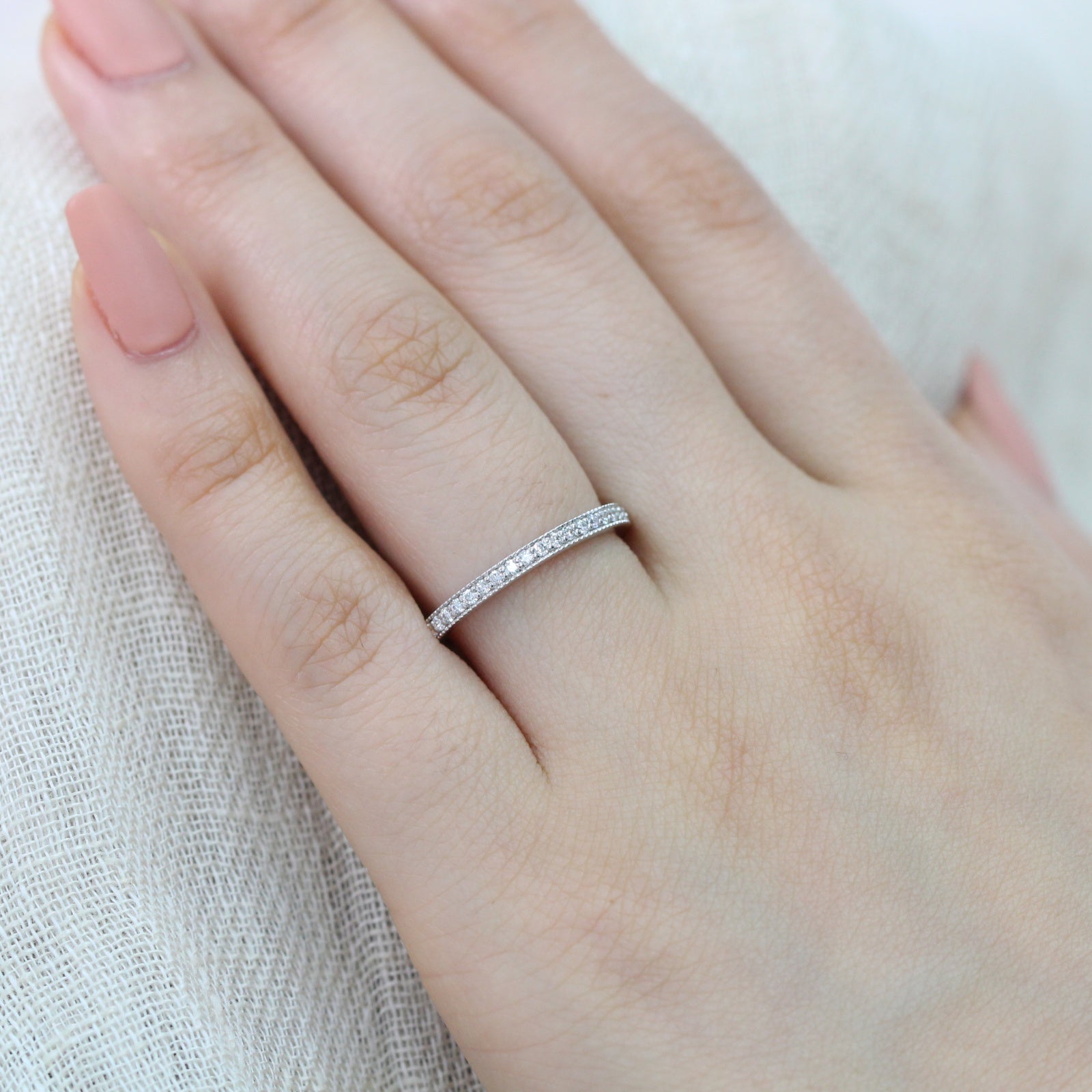 half eternity diamond wedding ring in white gold milgrain band 