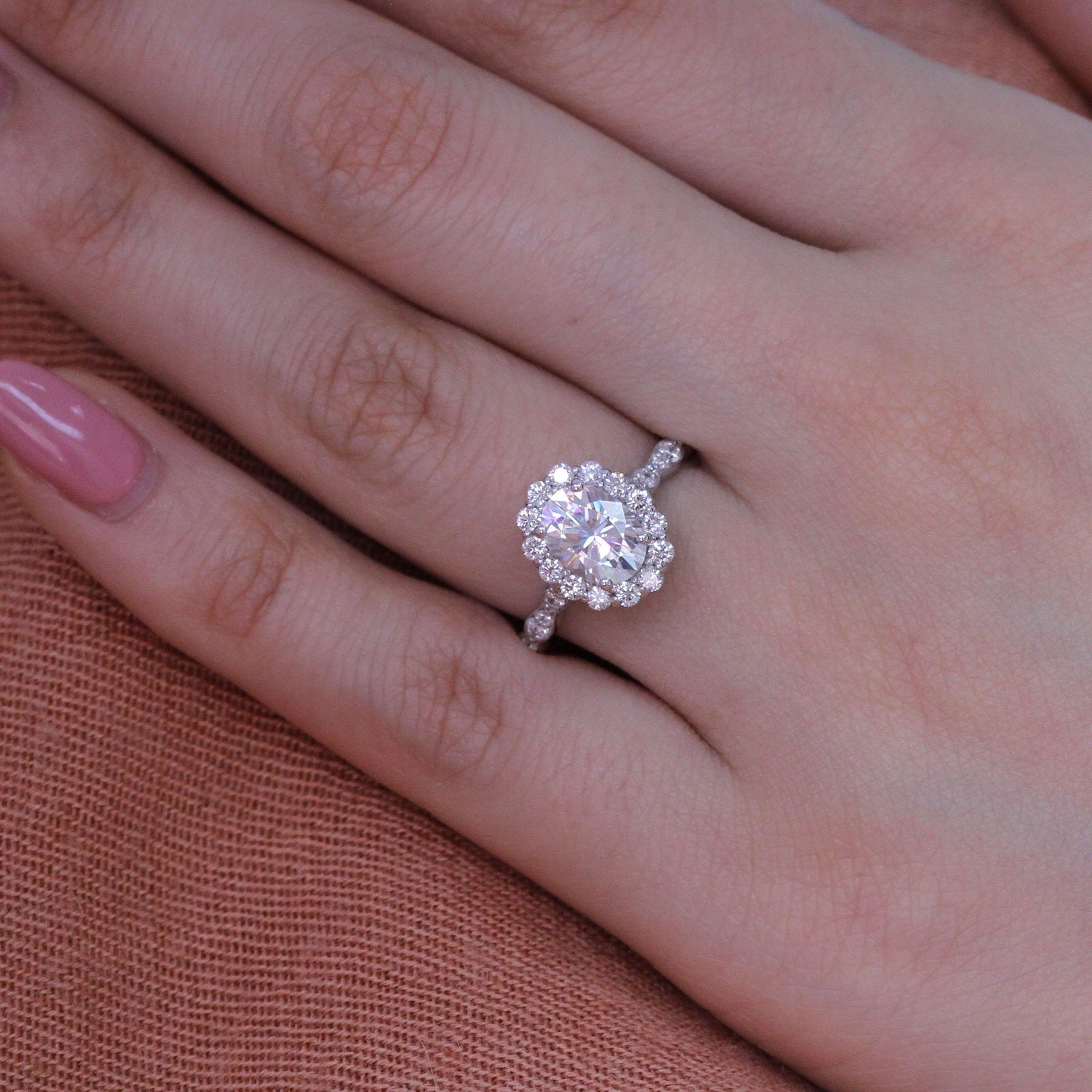 oval moissanite engagement ring in white gold halo diamond ring by la more design
