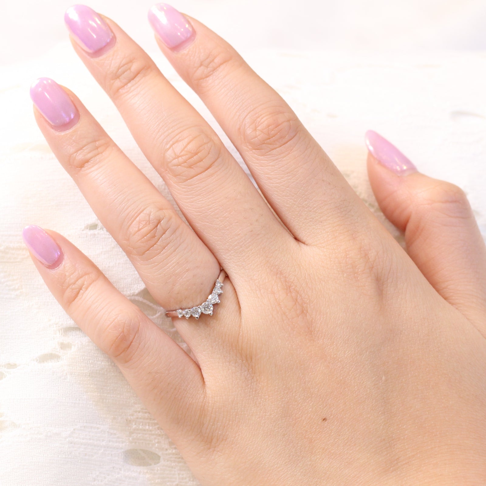 white gold curved diamond wedding ring in 7 stone diamond wedding band by la more design jewelry